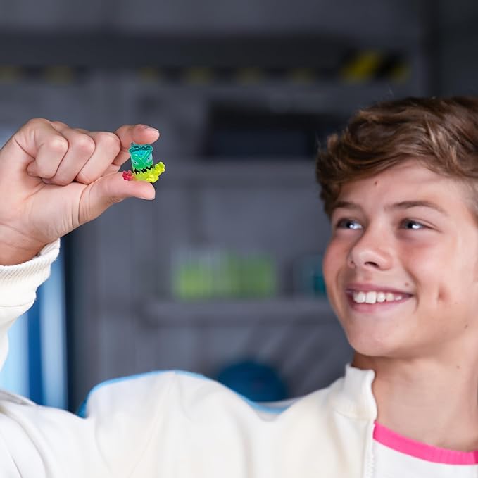 MrBeast Lab Swarms Series 2 Atomic Cash Case– 18-Pack Collectible Micro Beasts, Includes Exclusive Ultra Rare & Special Edition Figures, Reveal 2 with Water & Shake Test Tube, 1" Figures for Kids 5+