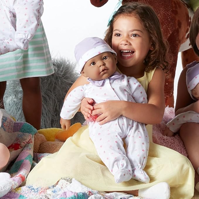 JC Toys - La Baby - Hispanic 20-inch Large Soft Body Baby Doll - Washable - Removable Purple Outfit with Hat and Pacifier - For Children 2 Years and up