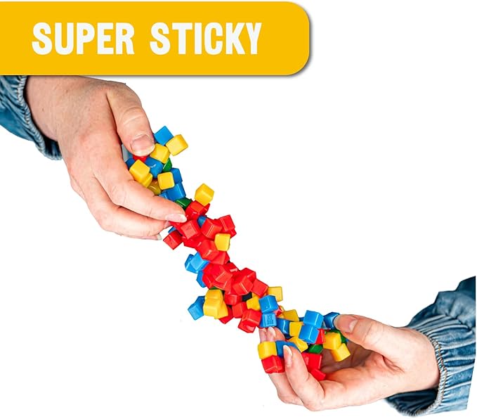 KOMARC GAMES StickiKubes, Mini Stacking Cubes That Stick to Anything, Non Toxic Kid Safe Sticky Blocks, Creative Construction Toy - 36 Cubes, 4 Colors, Display Easel