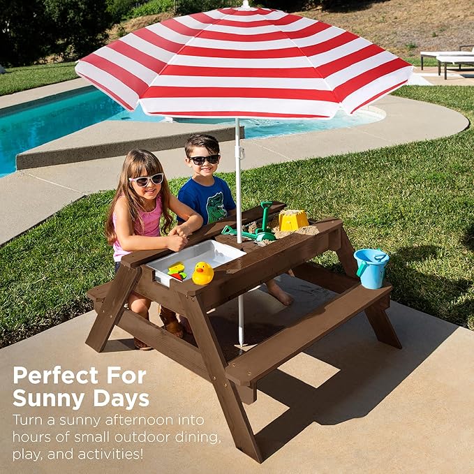 Best Choice Products Kids 3-in-1 Sand & Water Table, Wood Outdoor Convertible Picnic Table w/Umbrella, 2 Trays, Removable Top, 220lb Capacity Per Bench -Walnut/Red